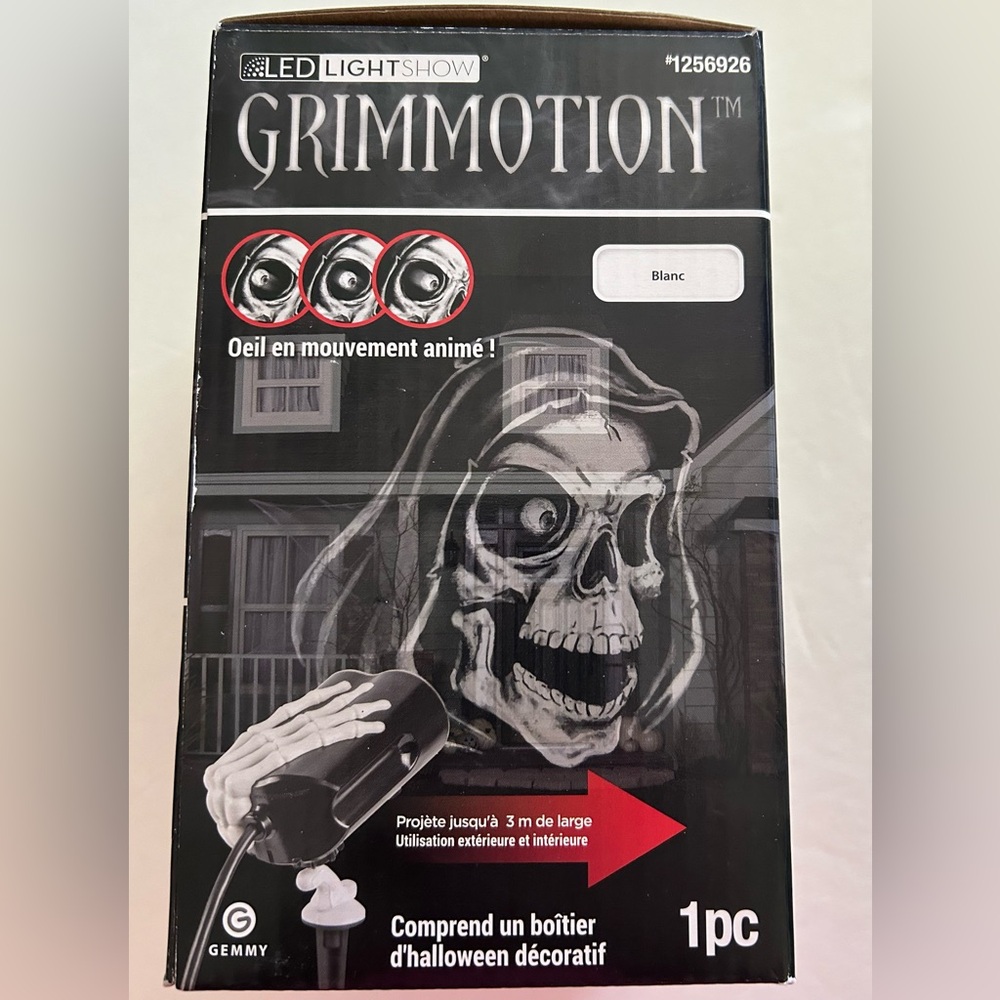 Halloween GrimMotion Projector Animated Moving Eye Skeleton Gemmy LED Li…